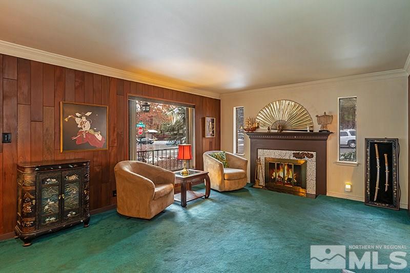 844 Whitaker Drive Reno, NV 89503 - Photo 17 of 34 a living room with furniture and a fireplace