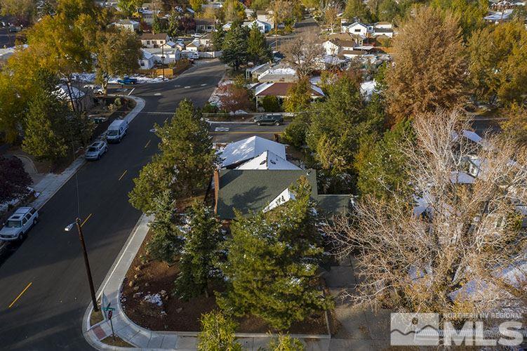 844 Whitaker Drive Reno, NV 89503 - Photo 2 of 34 an aerial view of residential house with outdoor space and trees all around