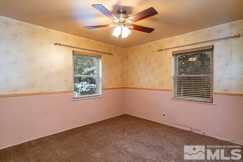 844 Whitaker Drive Reno, NV 89503 - Photo 24 of 34 a view of an empty room with a window