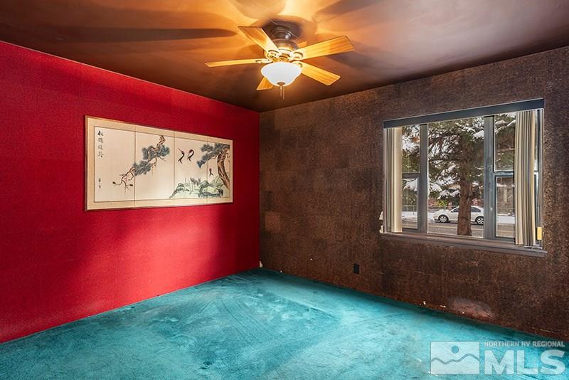 844 Whitaker Drive Reno, NV 89503 - Photo 25 of 34 an empty room with windows and closet