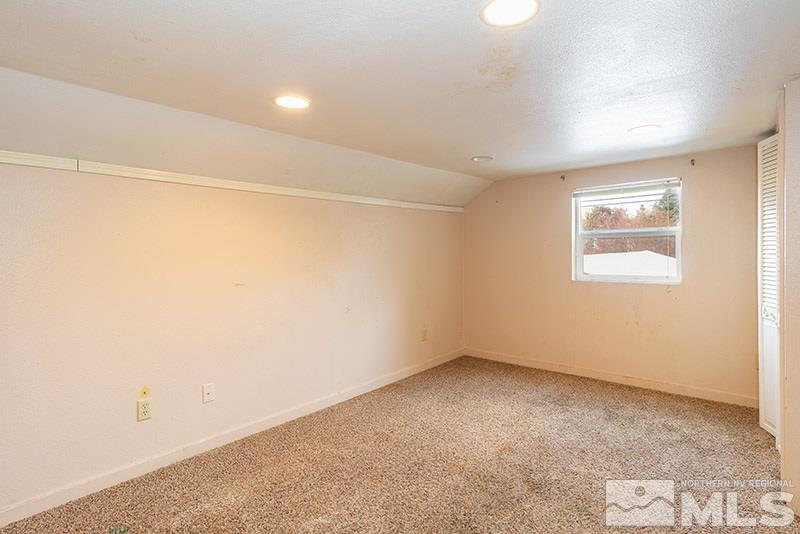 844 Whitaker Drive Reno, NV 89503 - Photo 30 of 34 an empty room with a empty space and a window