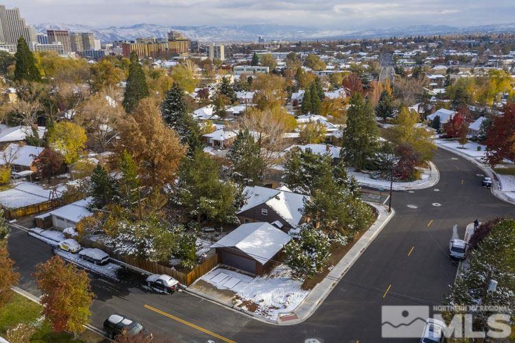 844 Whitaker Drive Reno, NV 89503 - Photo 7 of 34 an aerial view of residential houses with city view