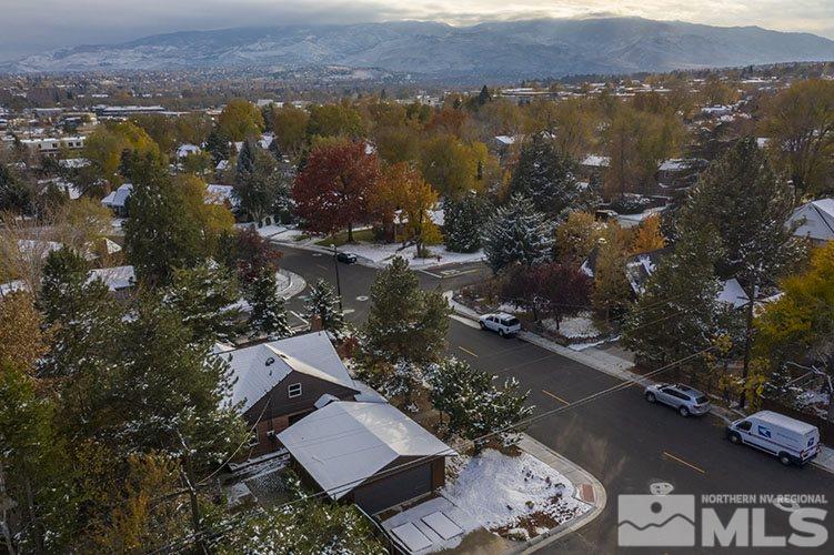 844 Whitaker Drive Reno, NV 89503 - Photo 9 of 34 an aerial view of mountain with yard and mountain view in back
