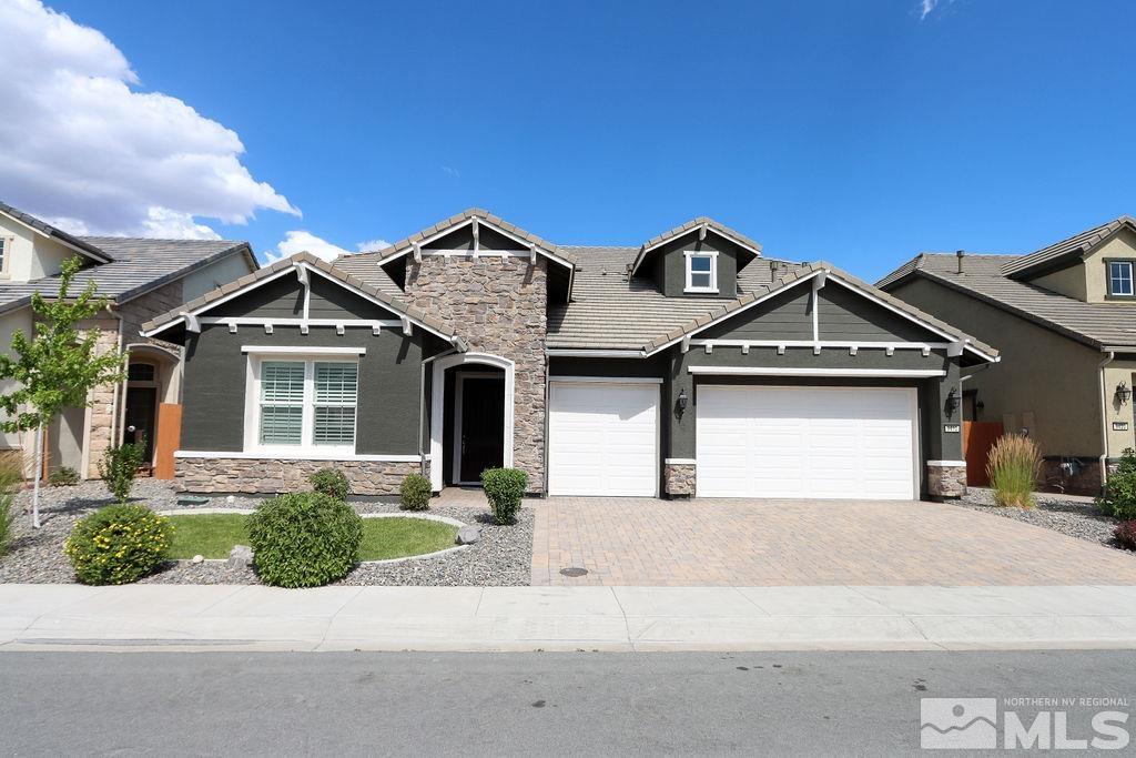 9410 Stony Hill Road Reno, NV 89521 - Photo 1 of 39 a front view of a house with yard