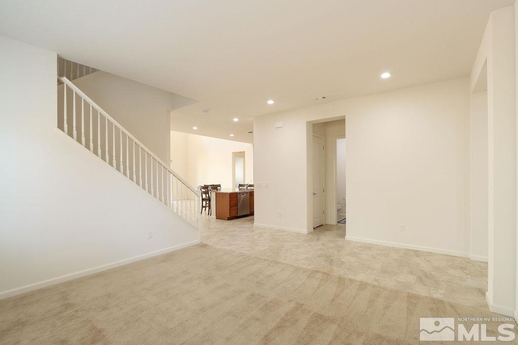 9410 Stony Hill Road Reno, NV 89521 - Photo 13 of 39 a view of an empty room with stairs