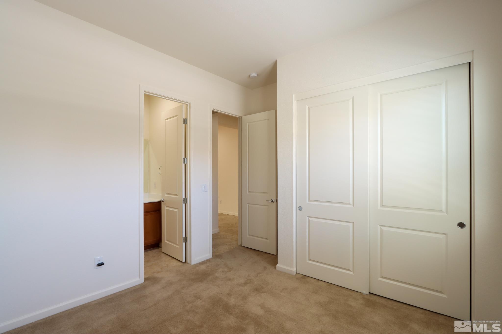 9410 Stony Hill Road Reno, NV 89521 - Photo 9 of 39 an empty room with closet area