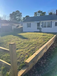 a view of swimming pool with outdoor seating