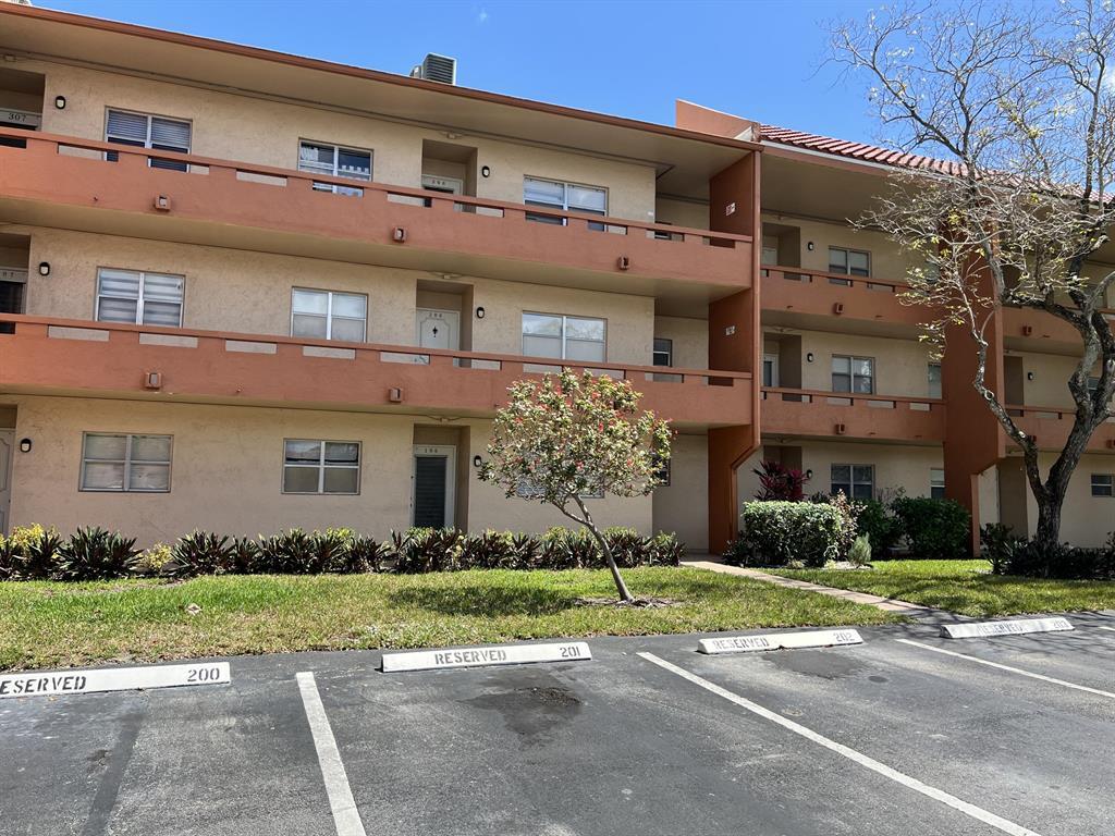 8810 West McNab Road, Unit 205 Tamarac, FL 33321 - Photo 1 of 11 front view of a building