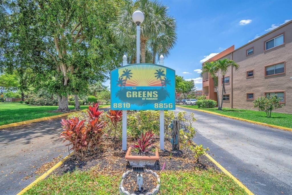 8810 West McNab Road, Unit 205 Tamarac, FL 33321 - Photo 9 of 11 a view of a sign board with yard