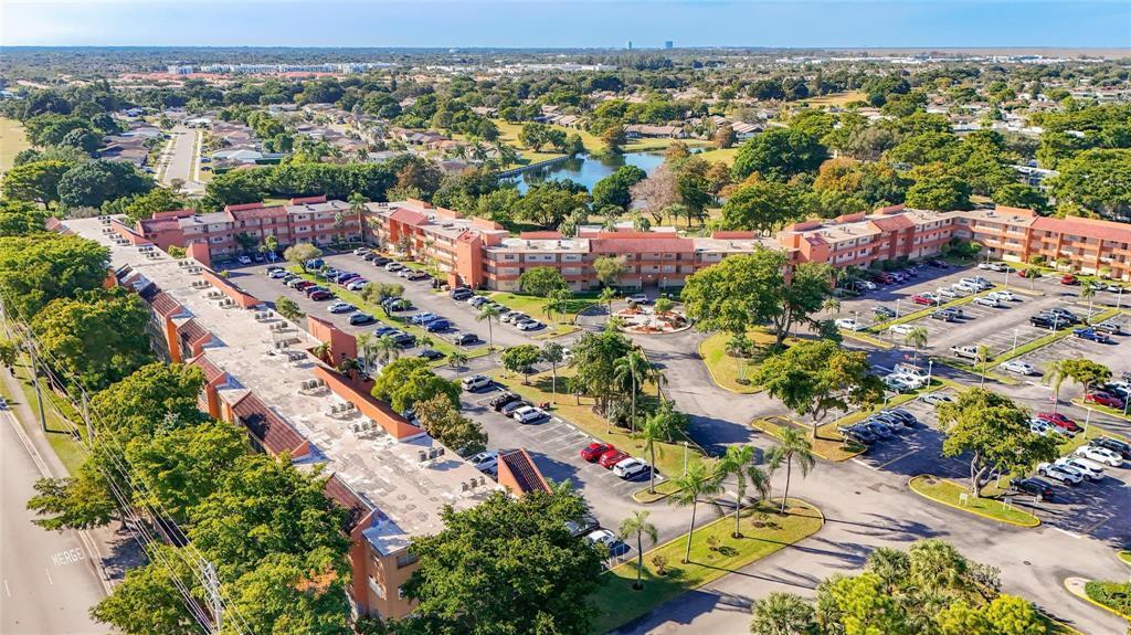 8810 West McNab Road, Unit 205 Tamarac, FL 33321 - Photo 10 of 11 an aerial view of residential houses with outdoor space