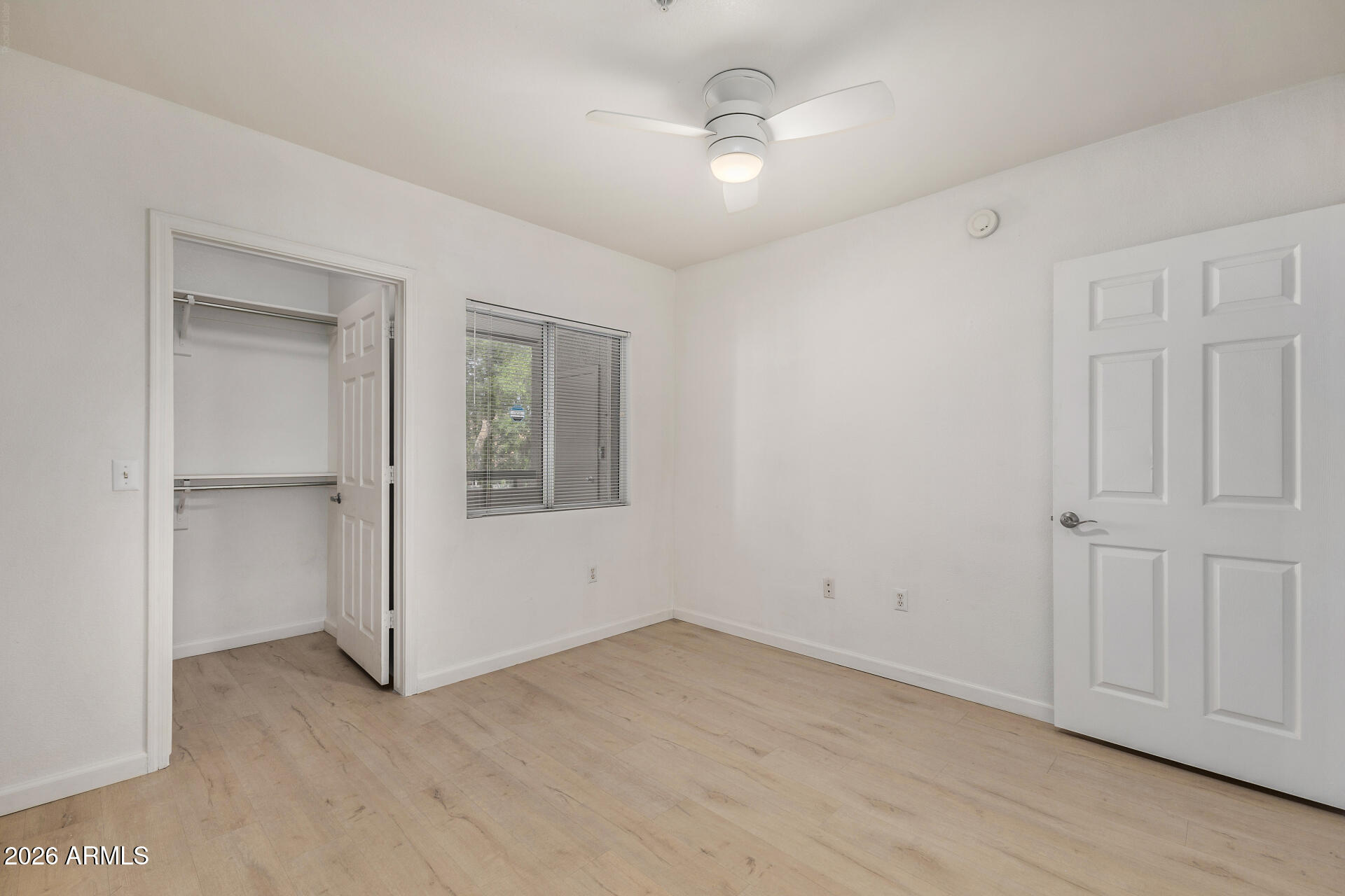 1295 North Ash Street, Unit 828 Gilbert, AZ 85233 - Photo 21 of 43 a view of an empty room with a window
