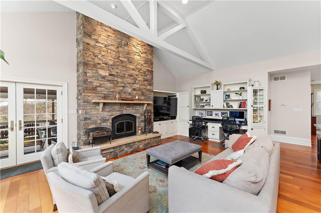 401 Redgate Road Sewickley, PA 15143 - Photo 11 of 50 a living room with furniture and a fireplace