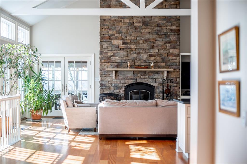401 Redgate Road Sewickley, PA 15143 - Photo 12 of 50 a living room with a couch and a fireplace