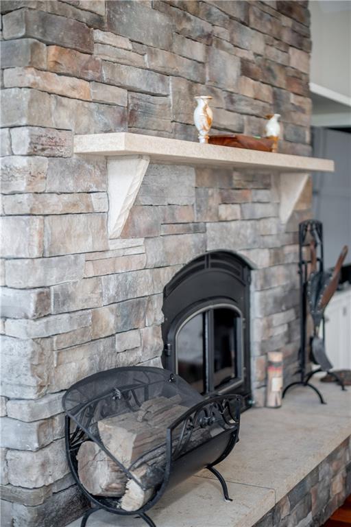 401 Redgate Road Sewickley, PA 15143 - Photo 13 of 50 a living room with furniture and a fireplace