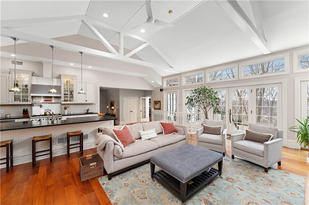 401 Redgate Road Sewickley, PA 15143 - Photo 17 of 50 a living room with furniture wooden floor and a large window