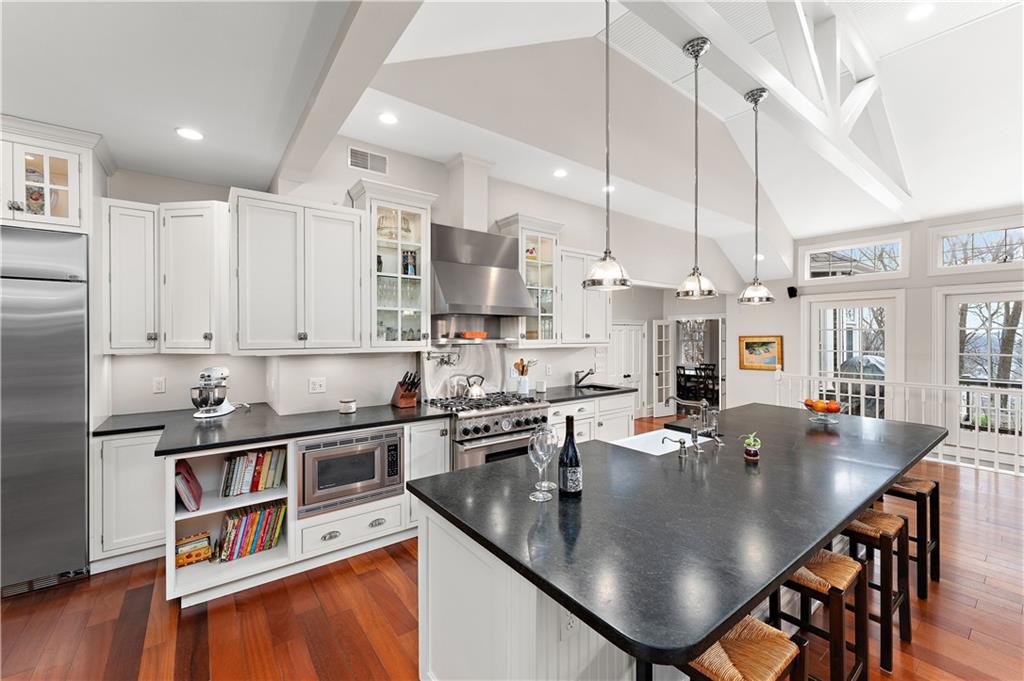 401 Redgate Road Sewickley, PA 15143 - Photo 23 of 50 a kitchen with stainless steel appliances granite countertop a sink a stove and a refrigerator