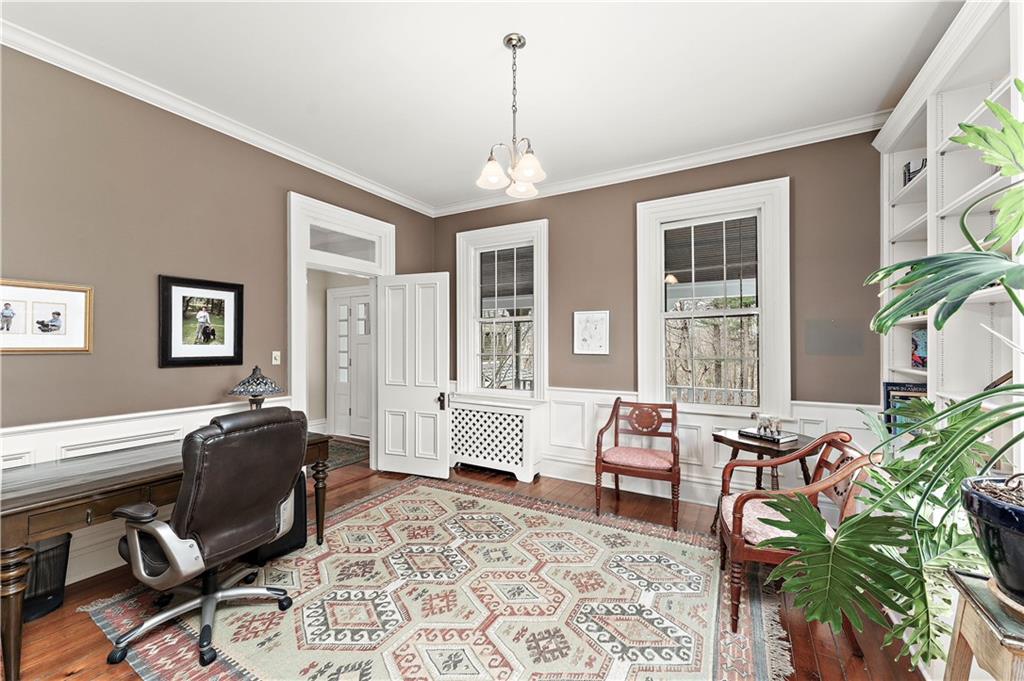 401 Redgate Road Sewickley, PA 15143 - Photo 31 of 50 a living room with furniture potted plant and a window