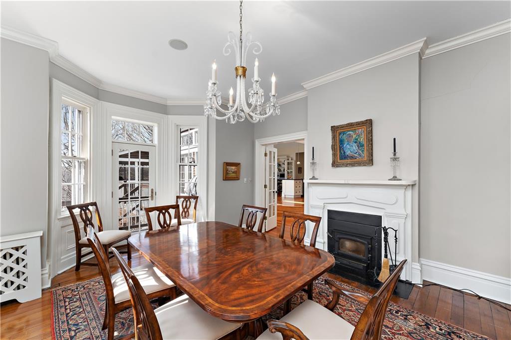 401 Redgate Road Sewickley, PA 15143 - Photo 32 of 50 a dining room with furniture a chandelier and wooden floor