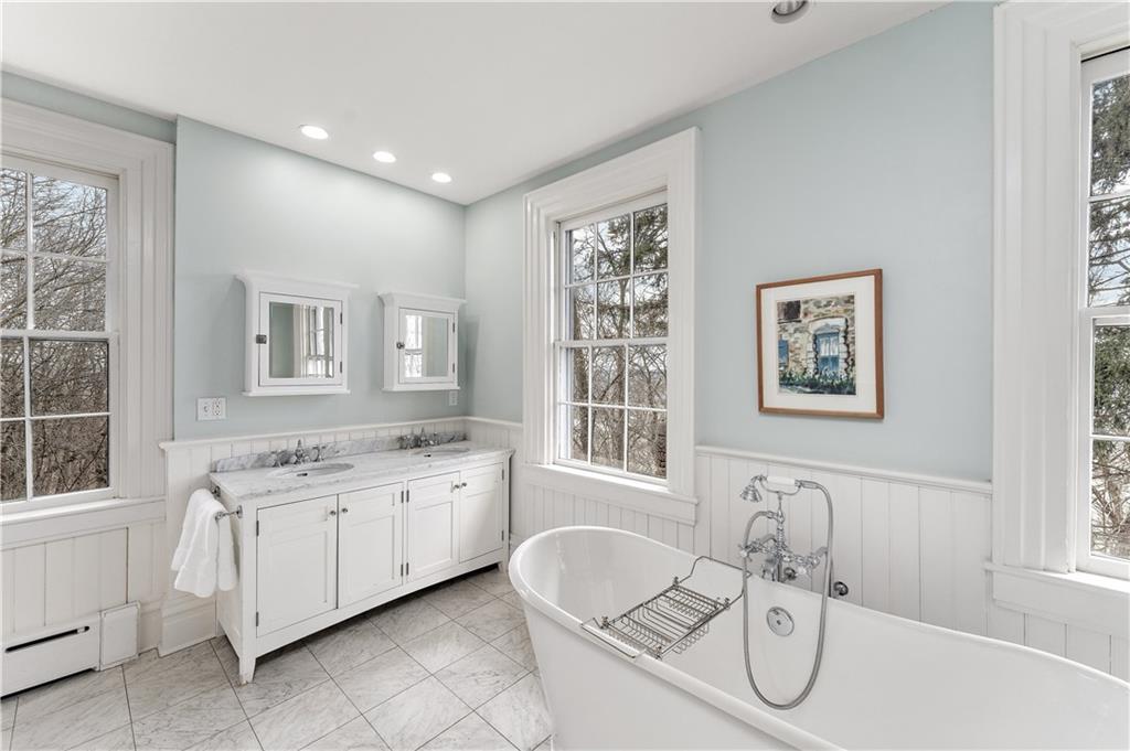 401 Redgate Road Sewickley, PA 15143 - Photo 40 of 50 a bathroom with a granite countertop sink mirror and bathtub