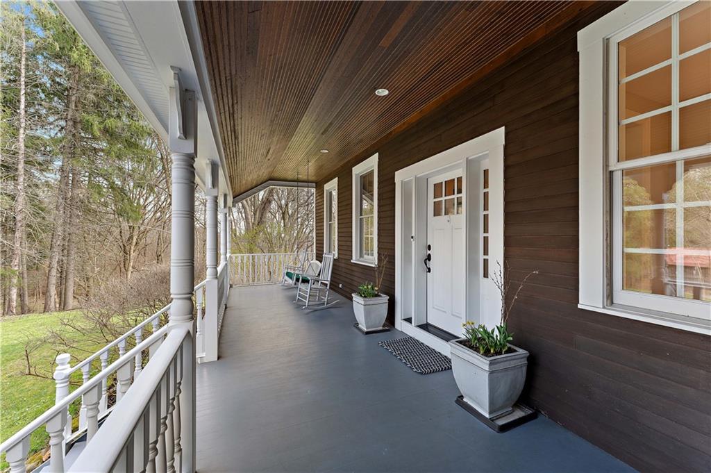 401 Redgate Road Sewickley, PA 15143 - Photo 8 of 50 a view of an entryway with wooden floor and windows