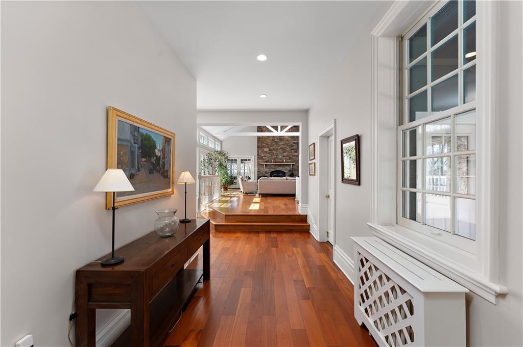 401 Redgate Road Sewickley, PA 15143 - Photo 9 of 50 a view of a hallway with workspace and wooden floor