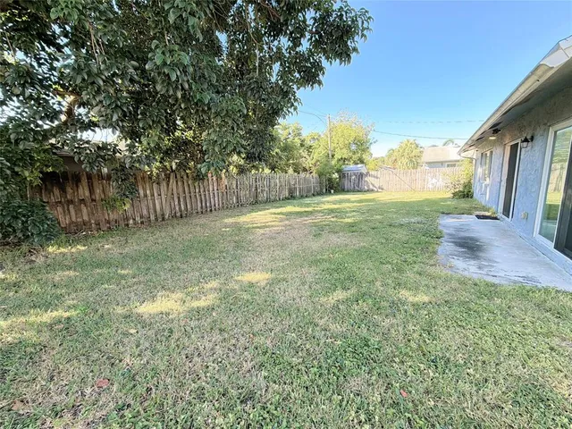 a view of a yard with an outdoor space