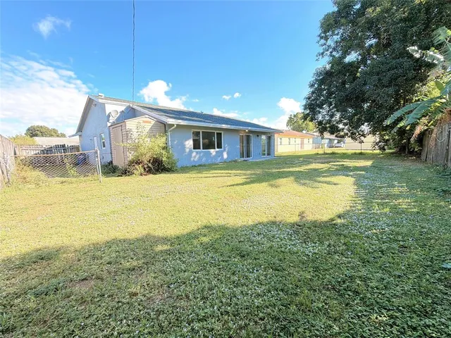 a view of a house with a swimming pool