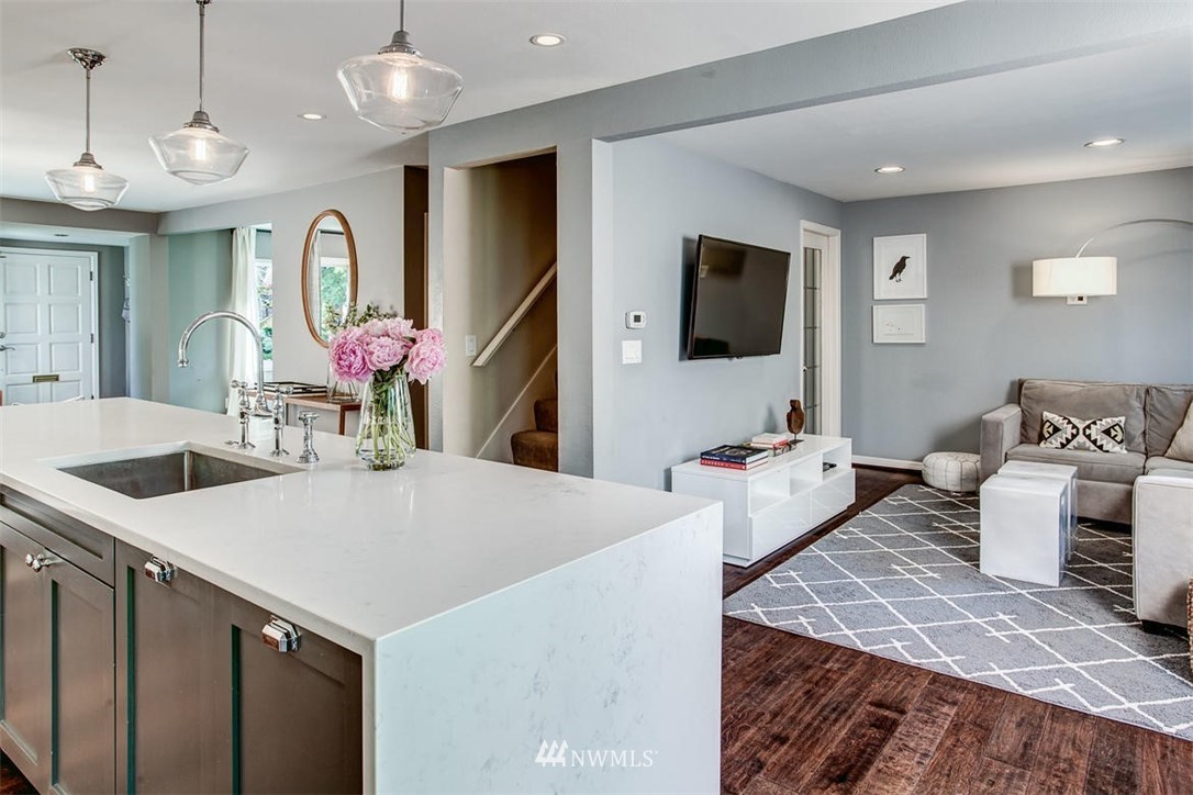 1612 East McGraw Street Seattle, WA 98112 - Photo 11 of 21 a living room with furniture and a flat screen tv