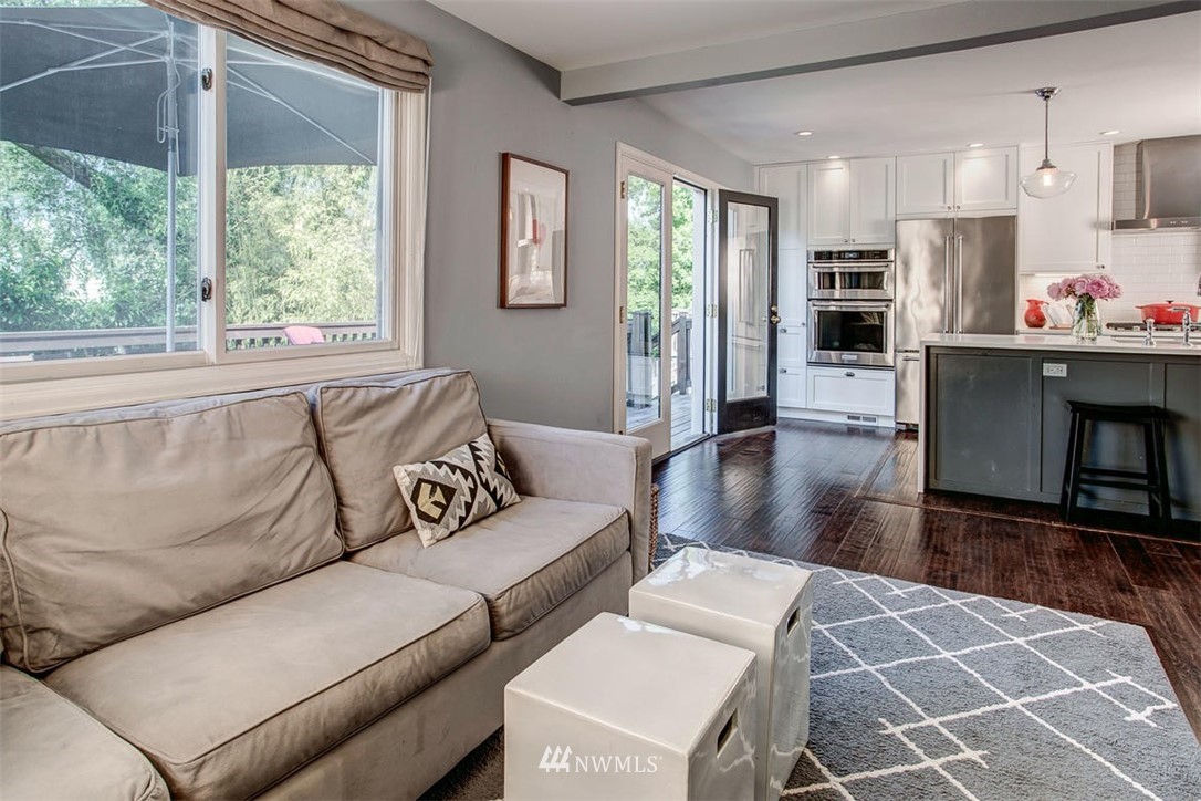 1612 East McGraw Street Seattle, WA 98112 - Photo 13 of 21 a living room with furniture and a large window