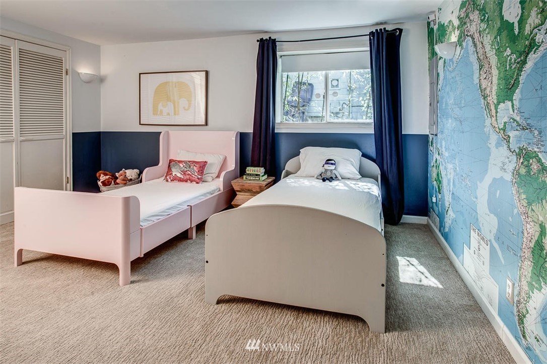 1612 East McGraw Street Seattle, WA 98112 - Photo 21 of 21 a bedroom with bed and a window