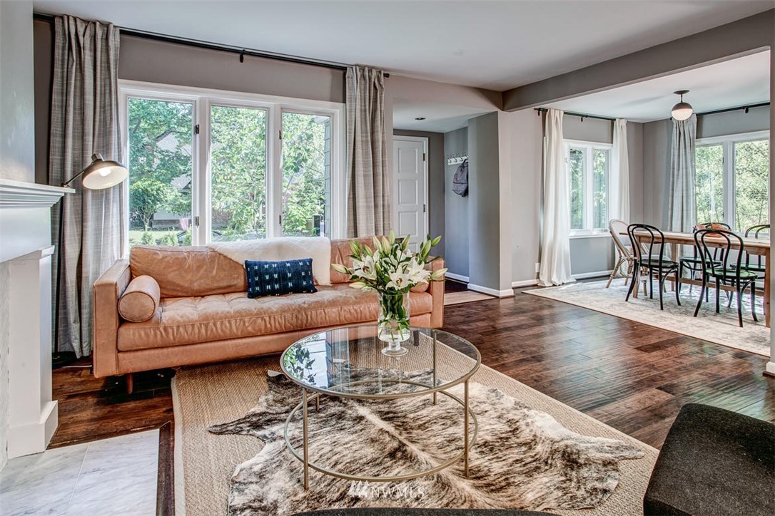 1612 East McGraw Street Seattle, WA 98112 - Photo 4 of 21 a living room with furniture and a large window