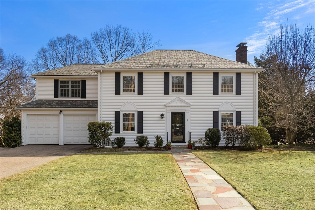 15 Shelley Road Wellesley, MA 02481 - Photo 1 of 1 a front view of a house with a yard