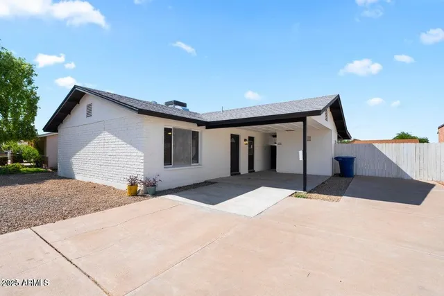 a front view of a house with a garage