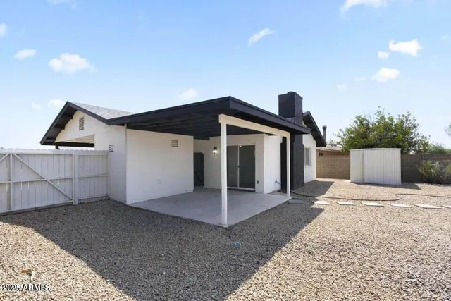 a front view of a house with a garage