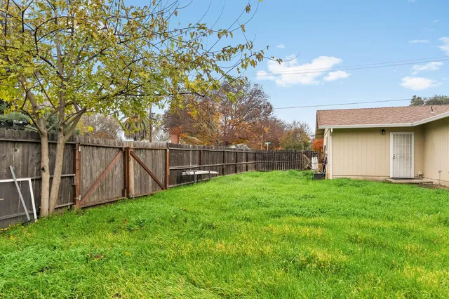 a view of a backyard with a garden