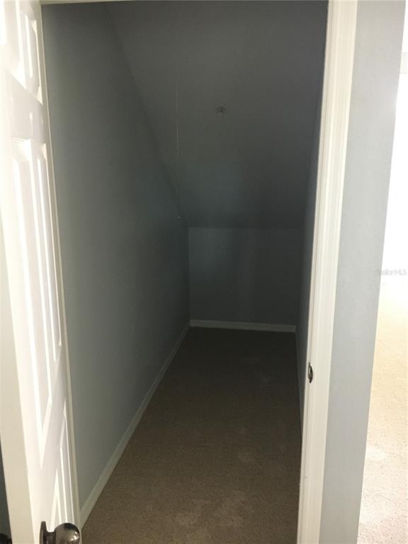 6304 Raleigh Street, Unit 204 Orlando, FL 32835 - Photo 13 of 29 a empty room with a window