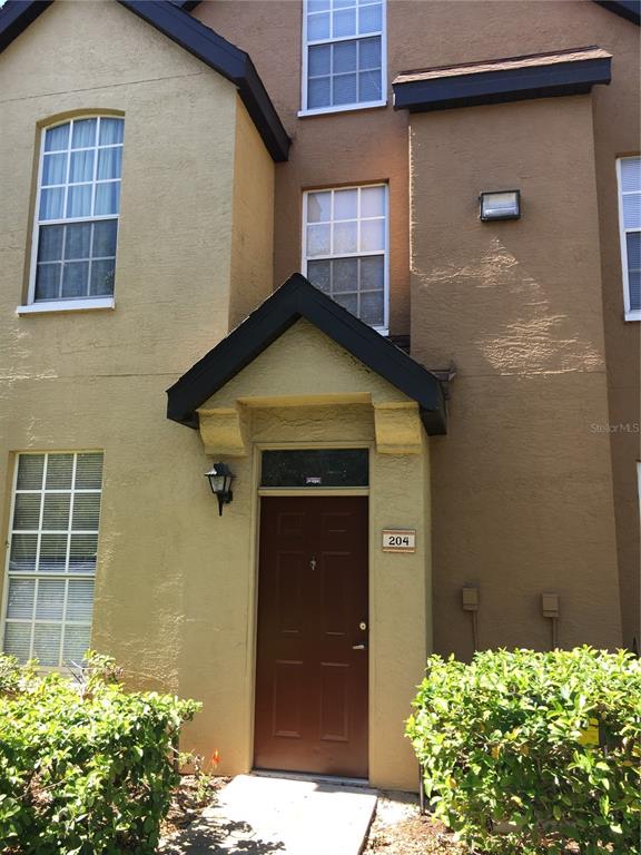 6304 Raleigh Street, Unit 204 Orlando, FL 32835 - Photo 4 of 29 a view of entryway