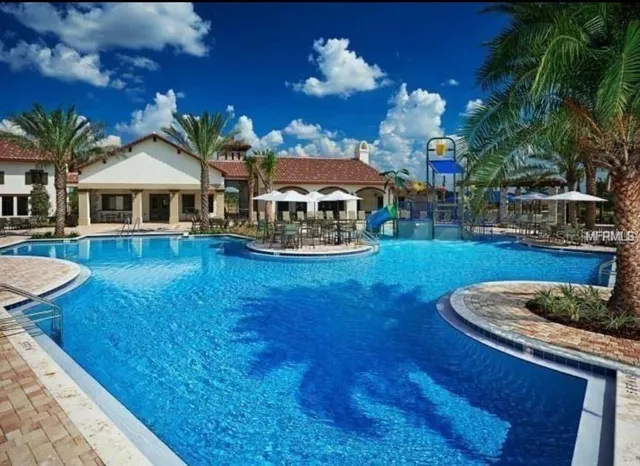 a view of a house with a yard porch and sitting area