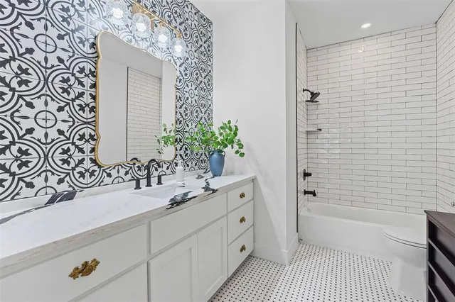 a bathroom with a sink and a bathtub