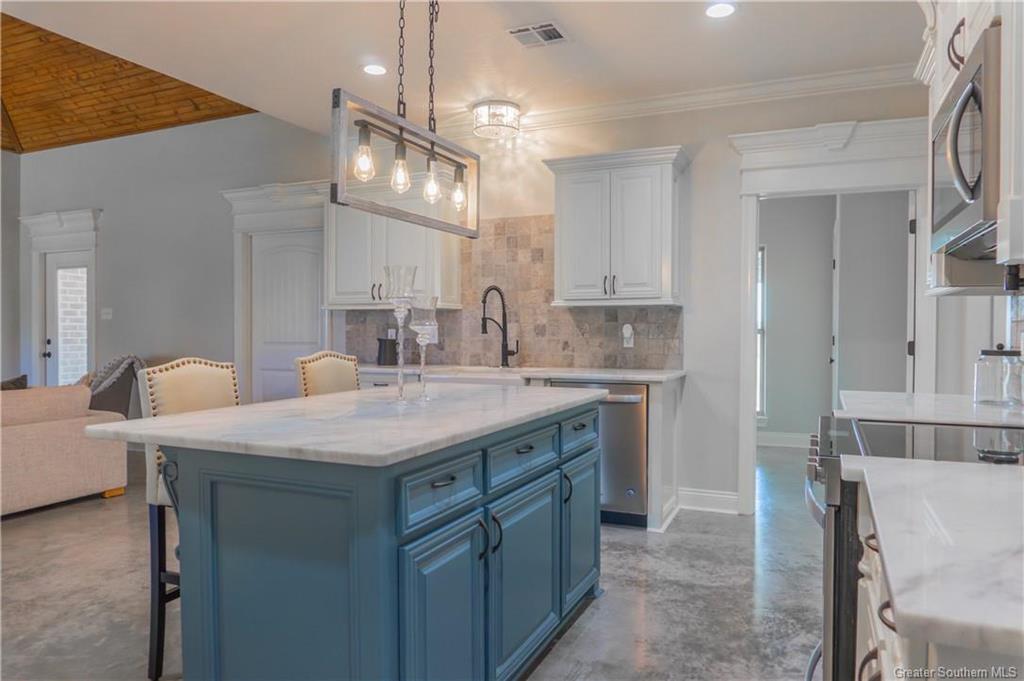 12129 Pousson Road Iowa, LA 70647 - Photo 8 of 23 Gallery Image 8
