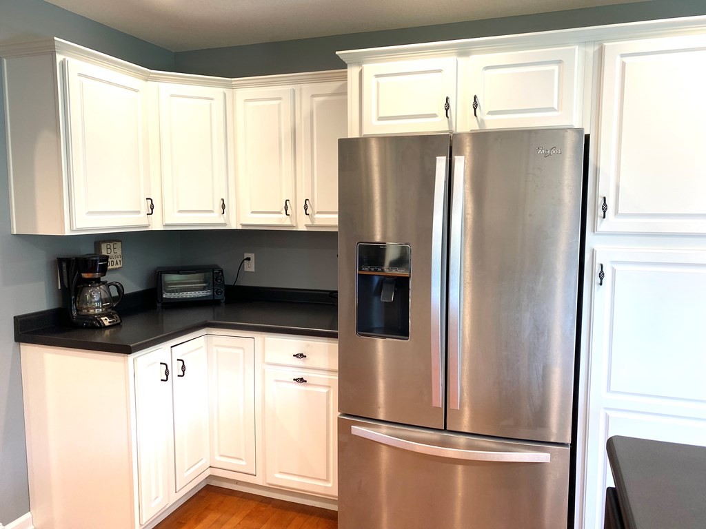 210 Clarks Store Sinking Fork Road Cerulean, KY 42215 - Photo 13 of 45 a kitchen with stainless steel appliances a refrigerator sink and cabinets