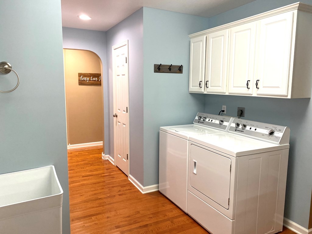 210 Clarks Store Sinking Fork Road Cerulean, KY 42215 - Photo 19 of 45 a utility room with cabinets washer and dryer