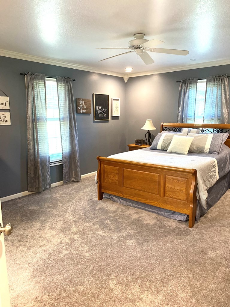 210 Clarks Store Sinking Fork Road Cerulean, KY 42215 - Photo 20 of 45 a bedroom with a bed and a window