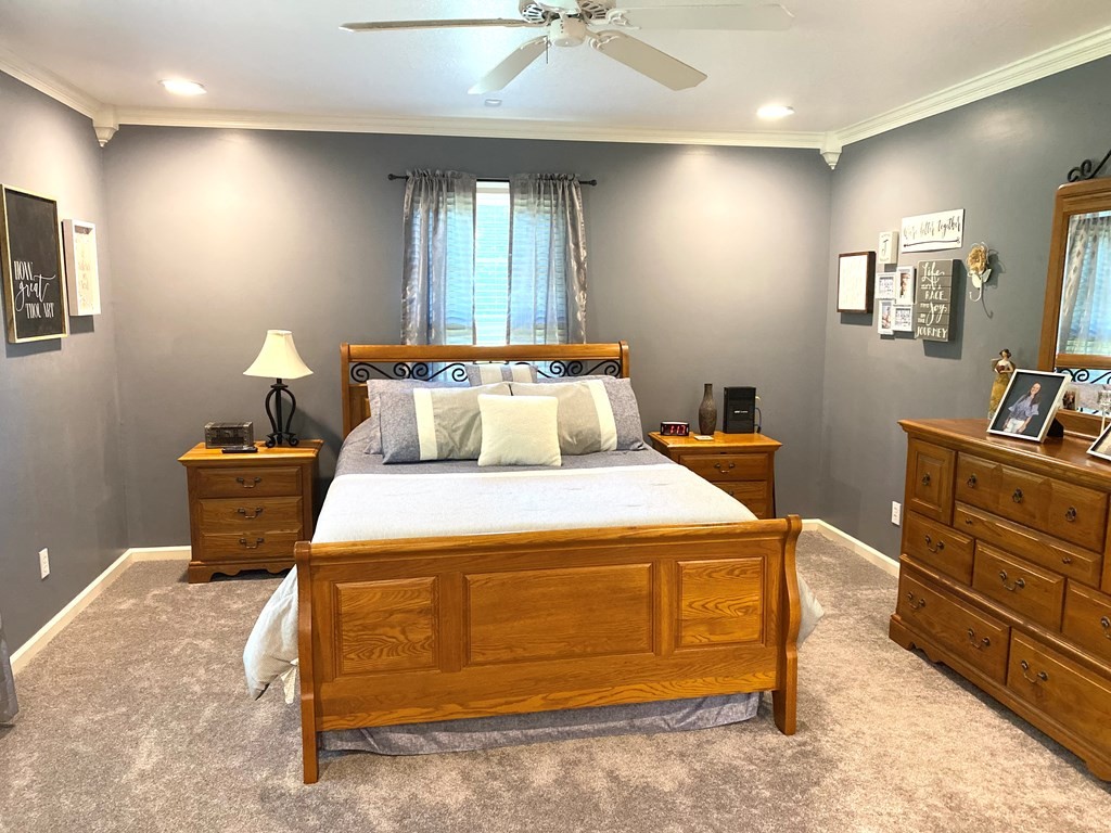 210 Clarks Store Sinking Fork Road Cerulean, KY 42215 - Photo 21 of 45 a bedroom with a bed and a tv