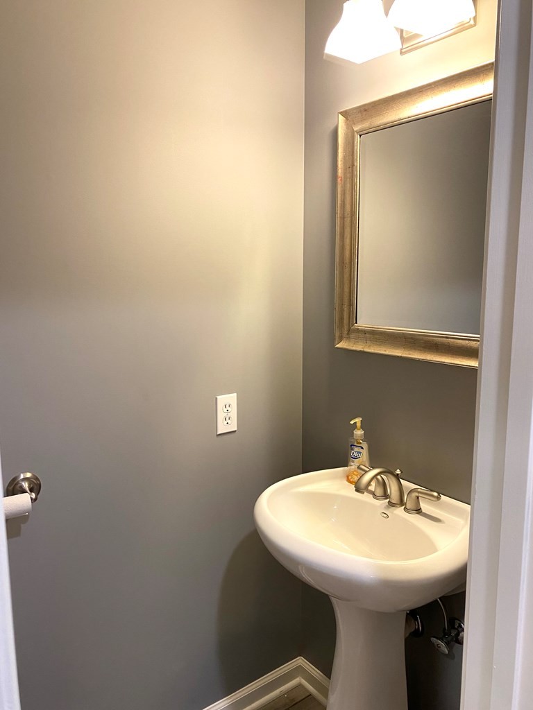 210 Clarks Store Sinking Fork Road Cerulean, KY 42215 - Photo 28 of 45 a bathroom with a sink and mirror