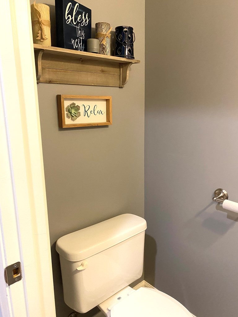 210 Clarks Store Sinking Fork Road Cerulean, KY 42215 - Photo 29 of 45 a toilet sitting next to a white wall