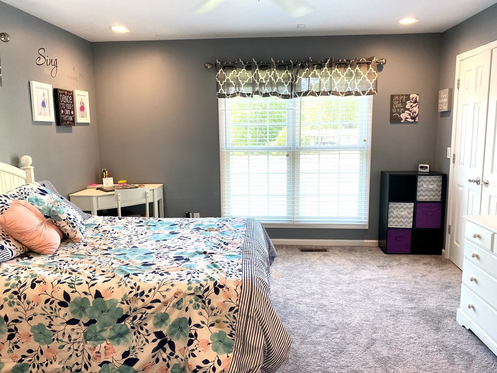 210 Clarks Store Sinking Fork Road Cerulean, KY 42215 - Photo 32 of 45 a bedroom with a bed and a window
