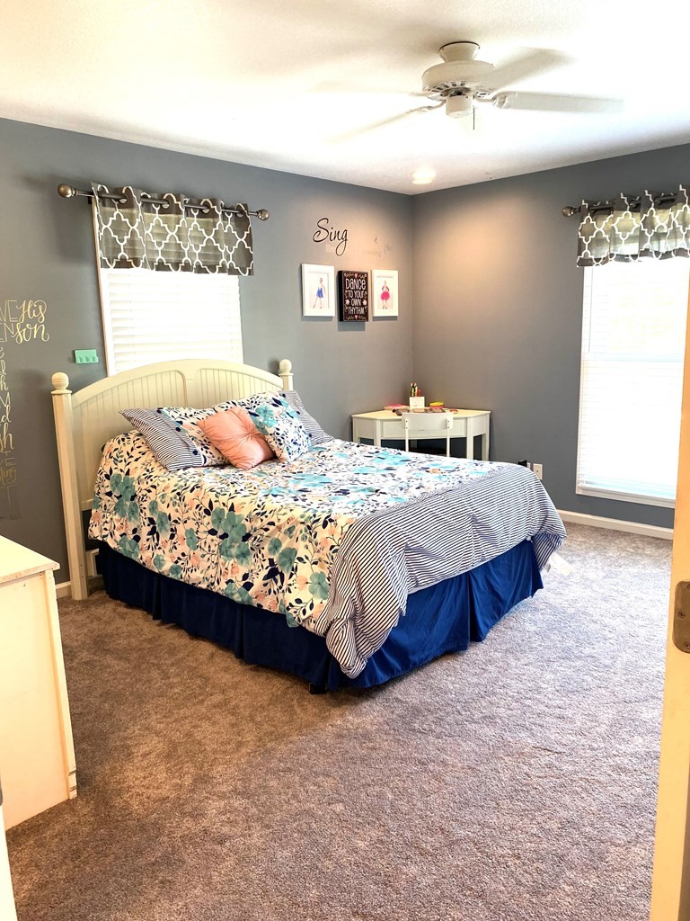 210 Clarks Store Sinking Fork Road Cerulean, KY 42215 - Photo 33 of 45 a bedroom with a bed dresser and window