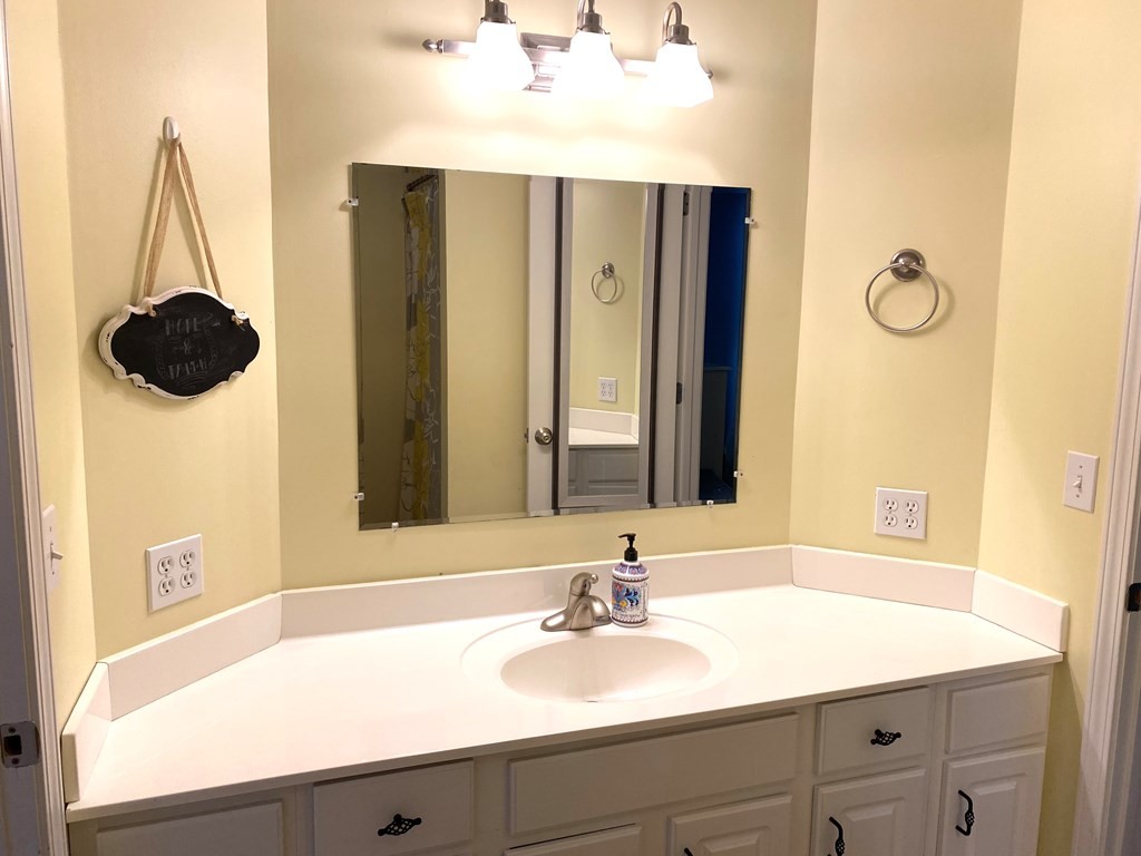 210 Clarks Store Sinking Fork Road Cerulean, KY 42215 - Photo 35 of 45 a bathroom with a sink and a mirror