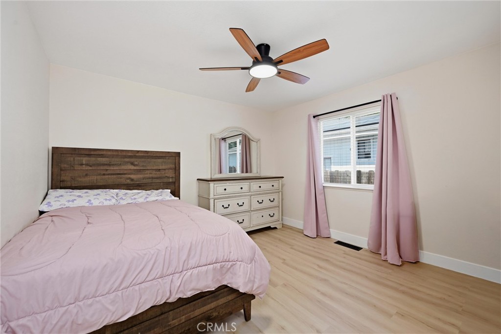 16906 Greenridge Road Hidden Valley Lake, CA 95467 - Photo 12 of 24 a bedroom with a bed and a tv